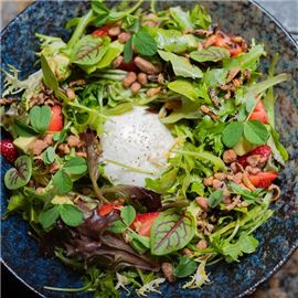 Burrata and Strawberry make the perfect pair for this light salad.